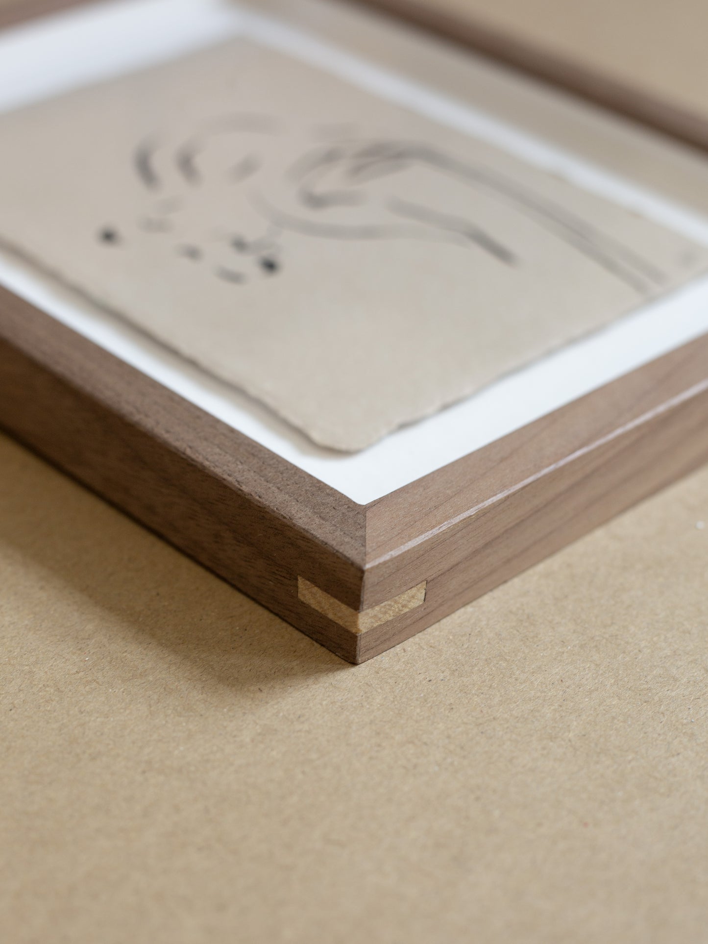 Close-up of walnut wood with oak splines 