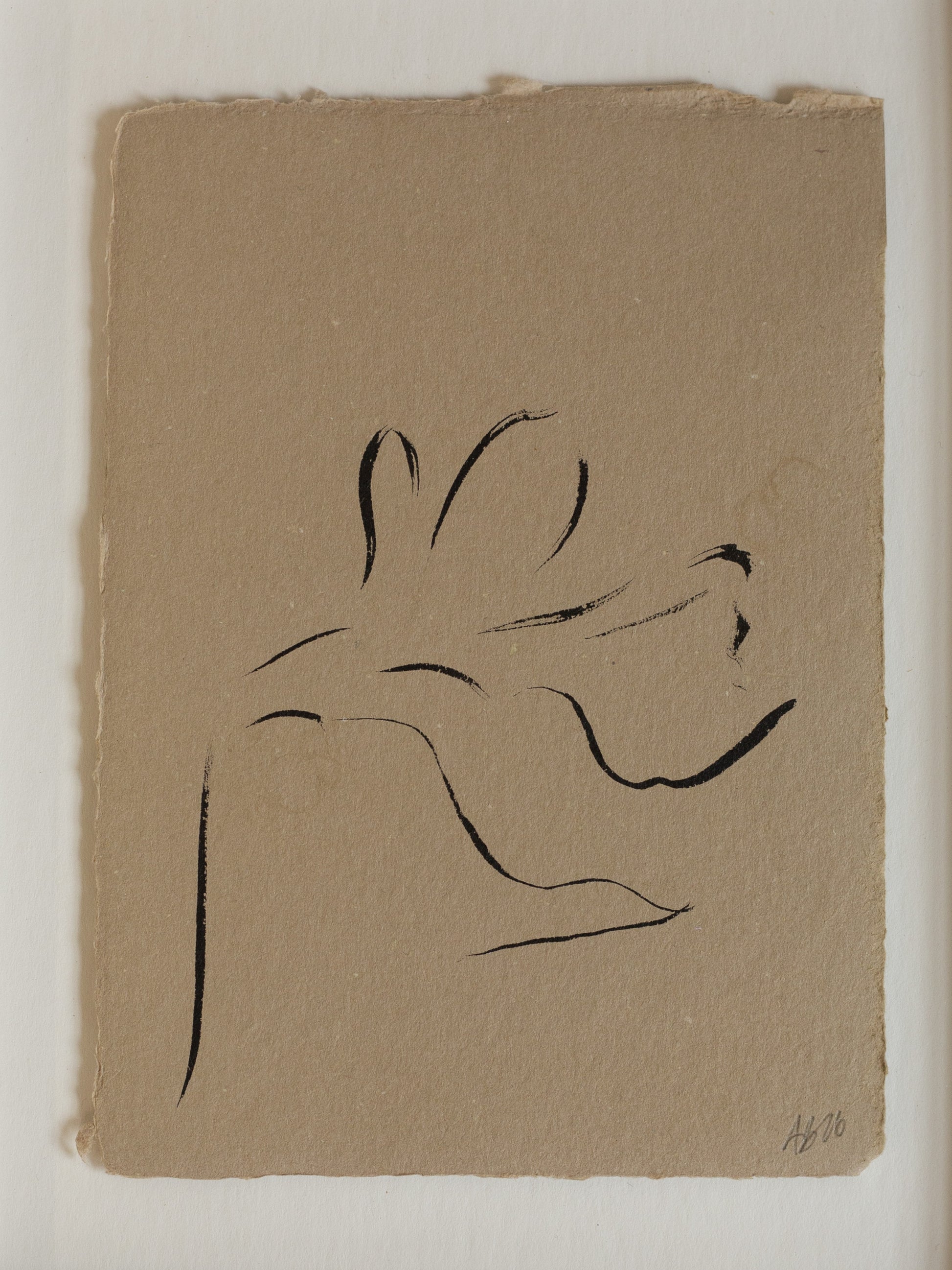 Abstract minimal indian ink drawing black on beige handmade paper