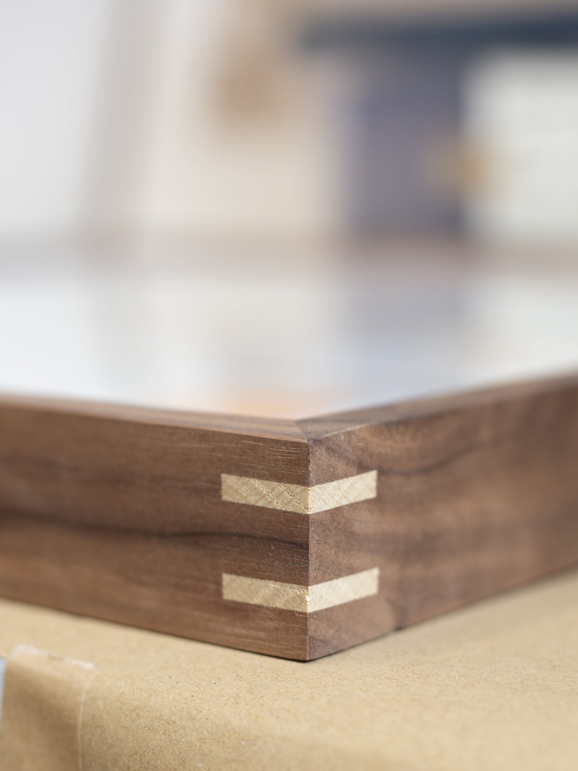 Close up of wooden frame with beautiful hand crafted corners 